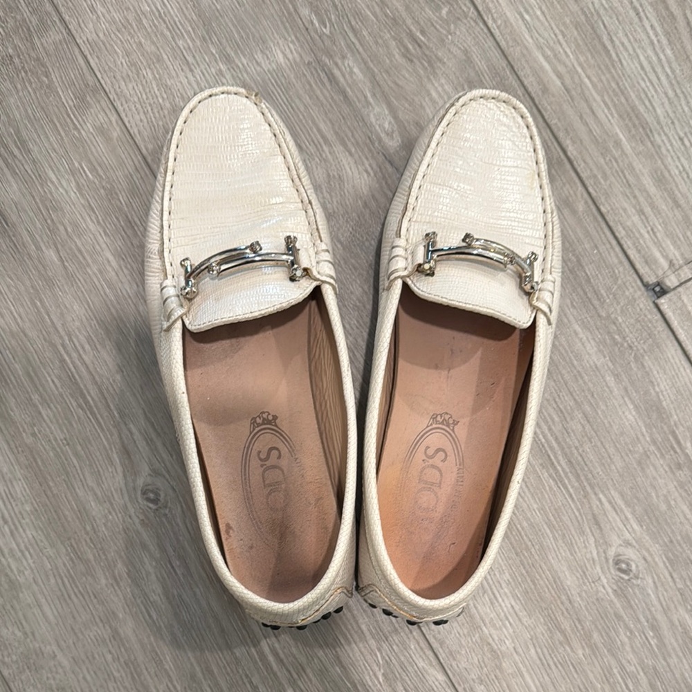 Tod’s white loafers